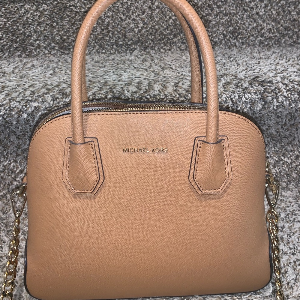 Michael Kor’s crossbody or handheld bag